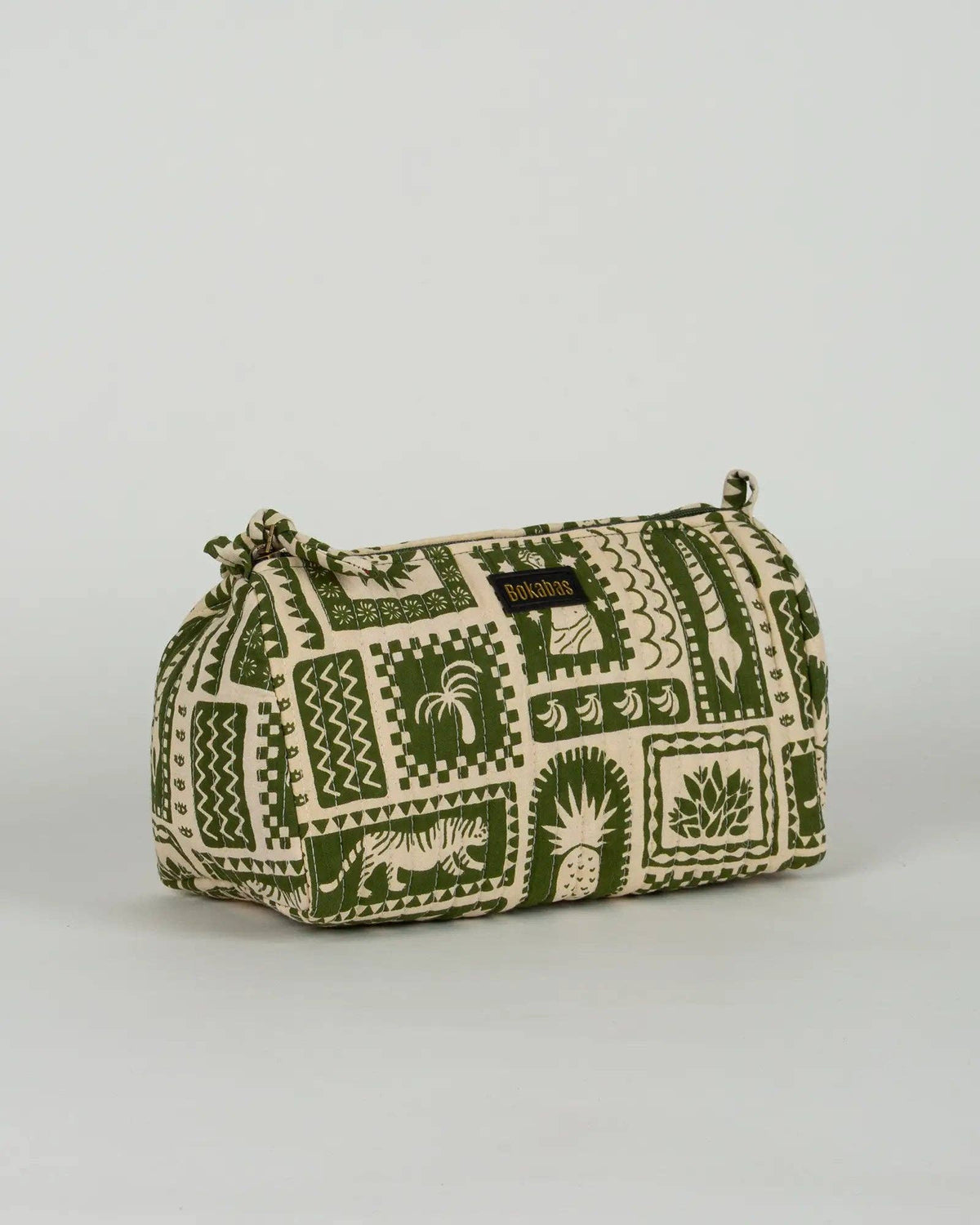 La trousse de toilette matelassée en coton Art vert