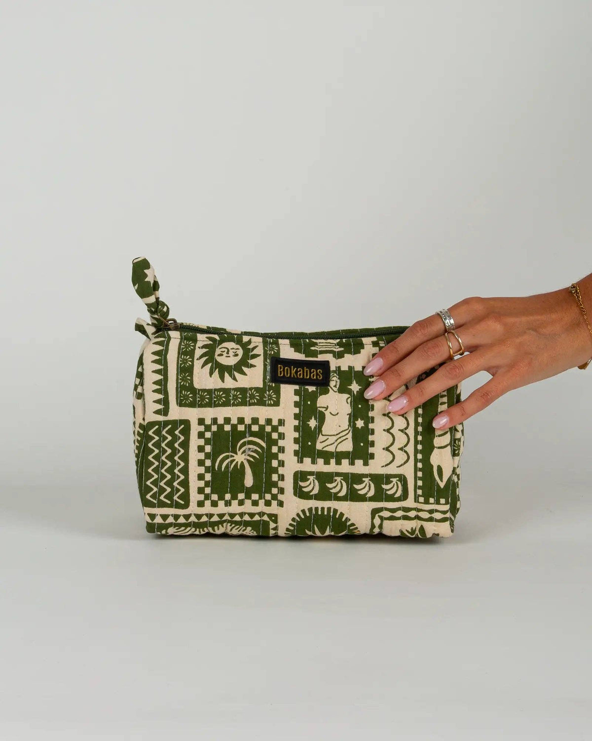 La trousse de toilette matelassée en coton Art vert