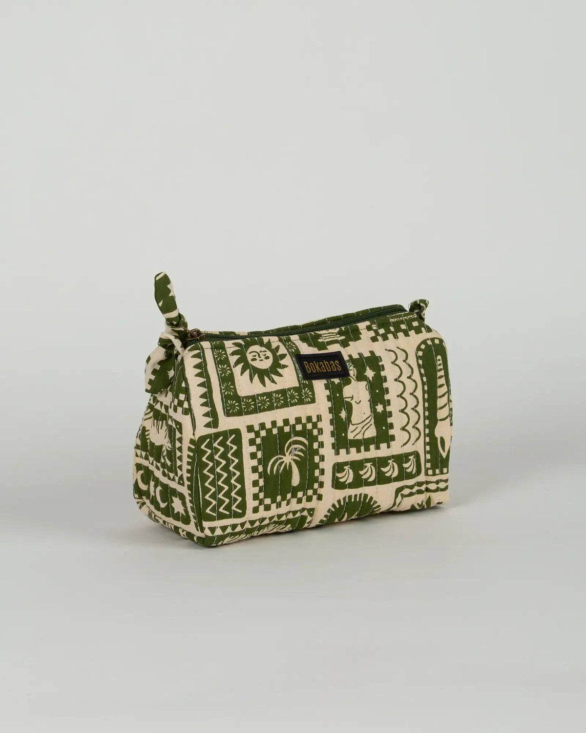 La trousse de toilette matelassée en coton Art vert